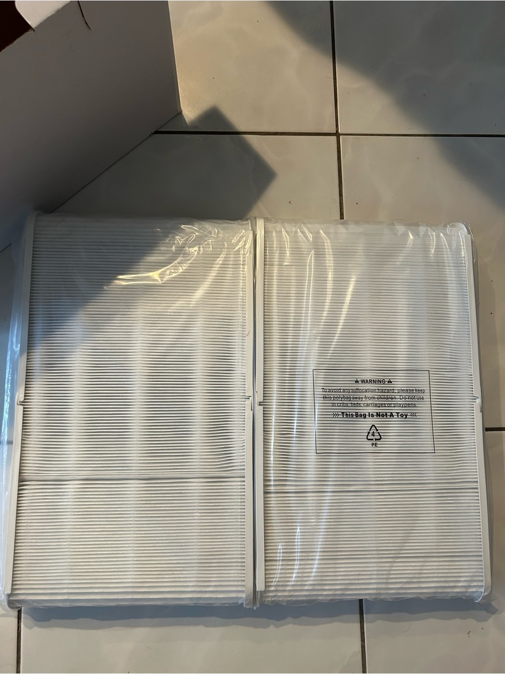 New in plastic. 2 Replacement White Pleated Air Filters. AD-Blue Air 211-01